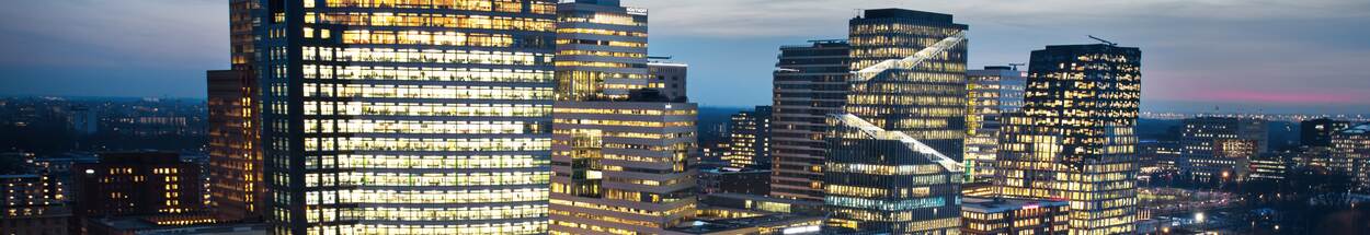 Zuidas in the dark with illuminated offices